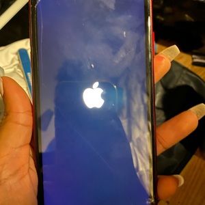 iPhone XR unlocked. Few cracks but no broken glass.